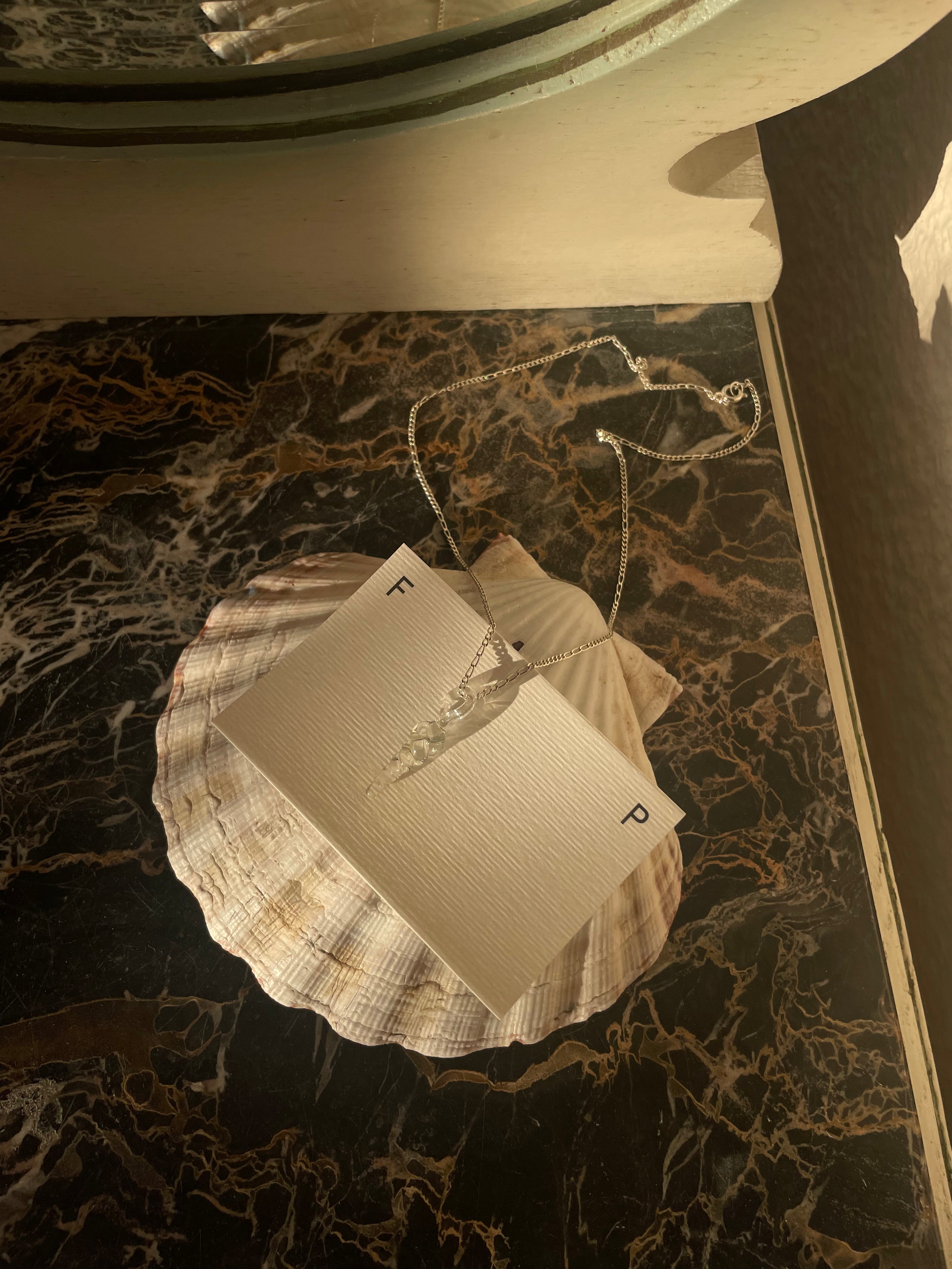 Collar Bucle Transparente