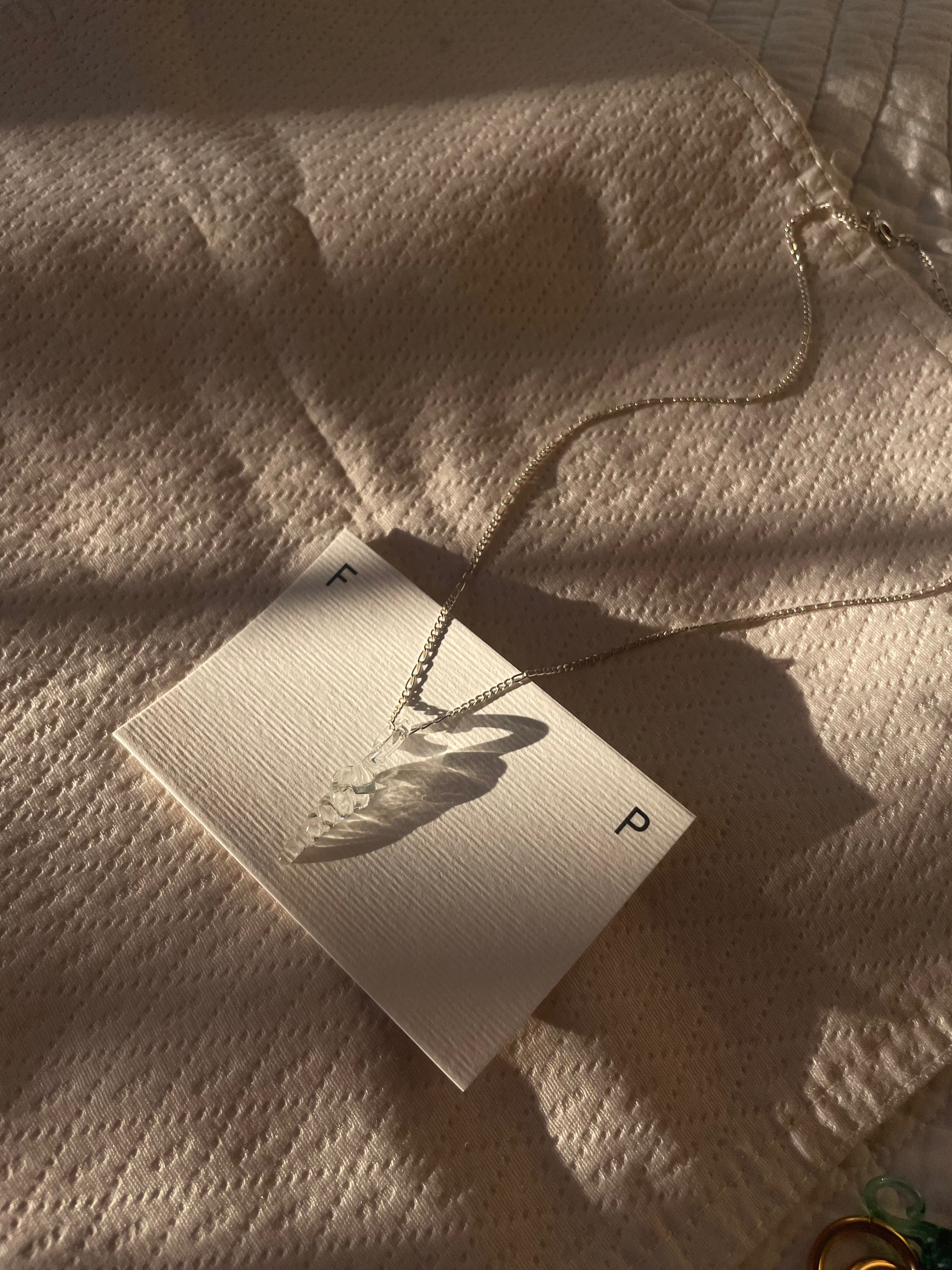 Collar Bucle Transparente