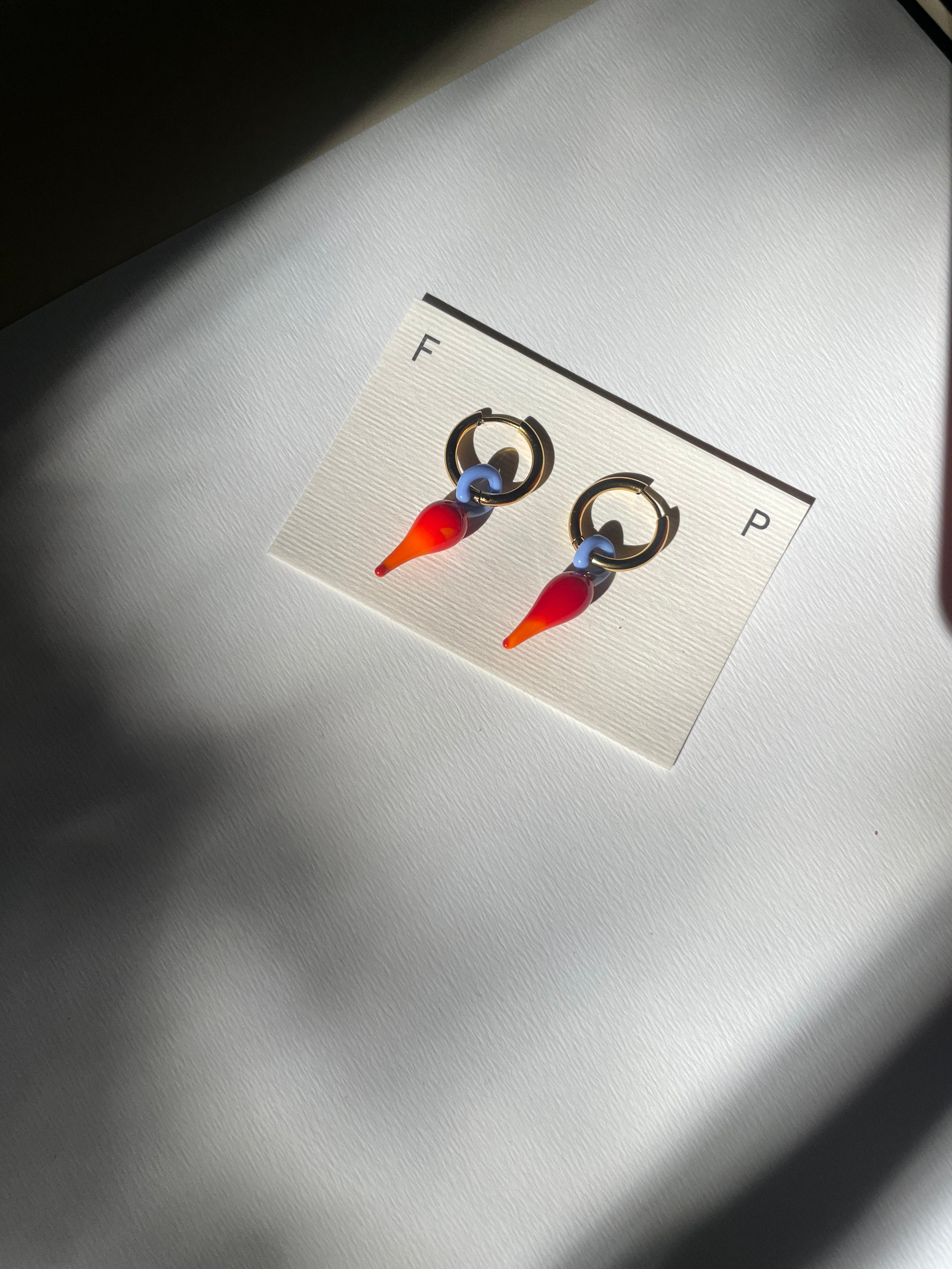 Aros Picantes Rojos y Lilas